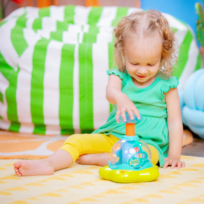 Розвивальні іграшки - Дзиґа Bright starts Press & glow spinner (10042)#4